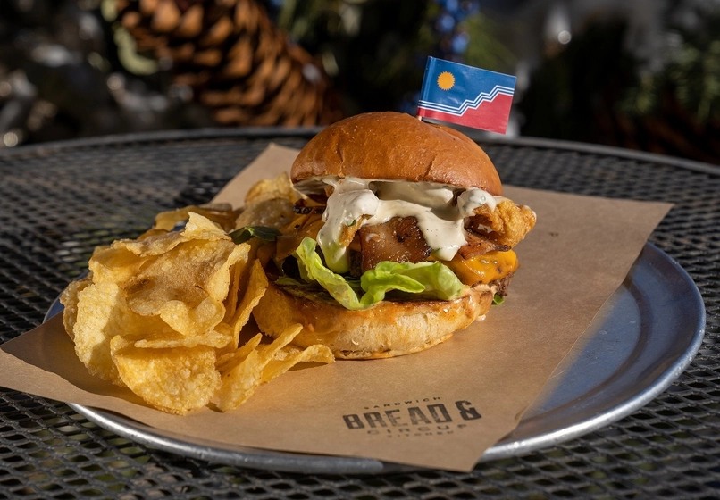 Burger and chips on a plate from Bread &amp; Circus Sandwich Kitchen