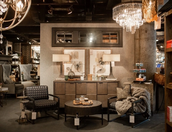 A home decor store showing many chairs, lights, etc.