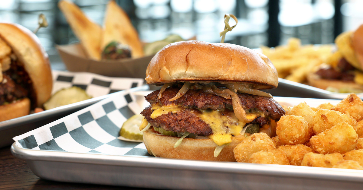 A burger and Tater Tots from The Lodge Bar and Grill