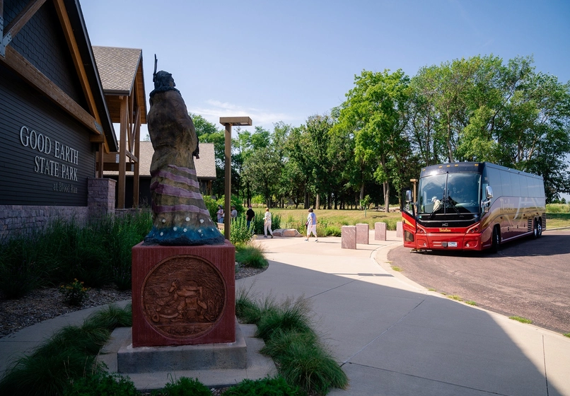 Tour Bus pulling up to Good Earth State Park Welcome Center